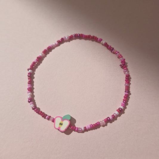 Pink Friendship Bracelet With A Apple Fruit