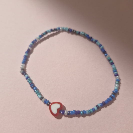 Blue Friendship Bracelet With A Red Heart