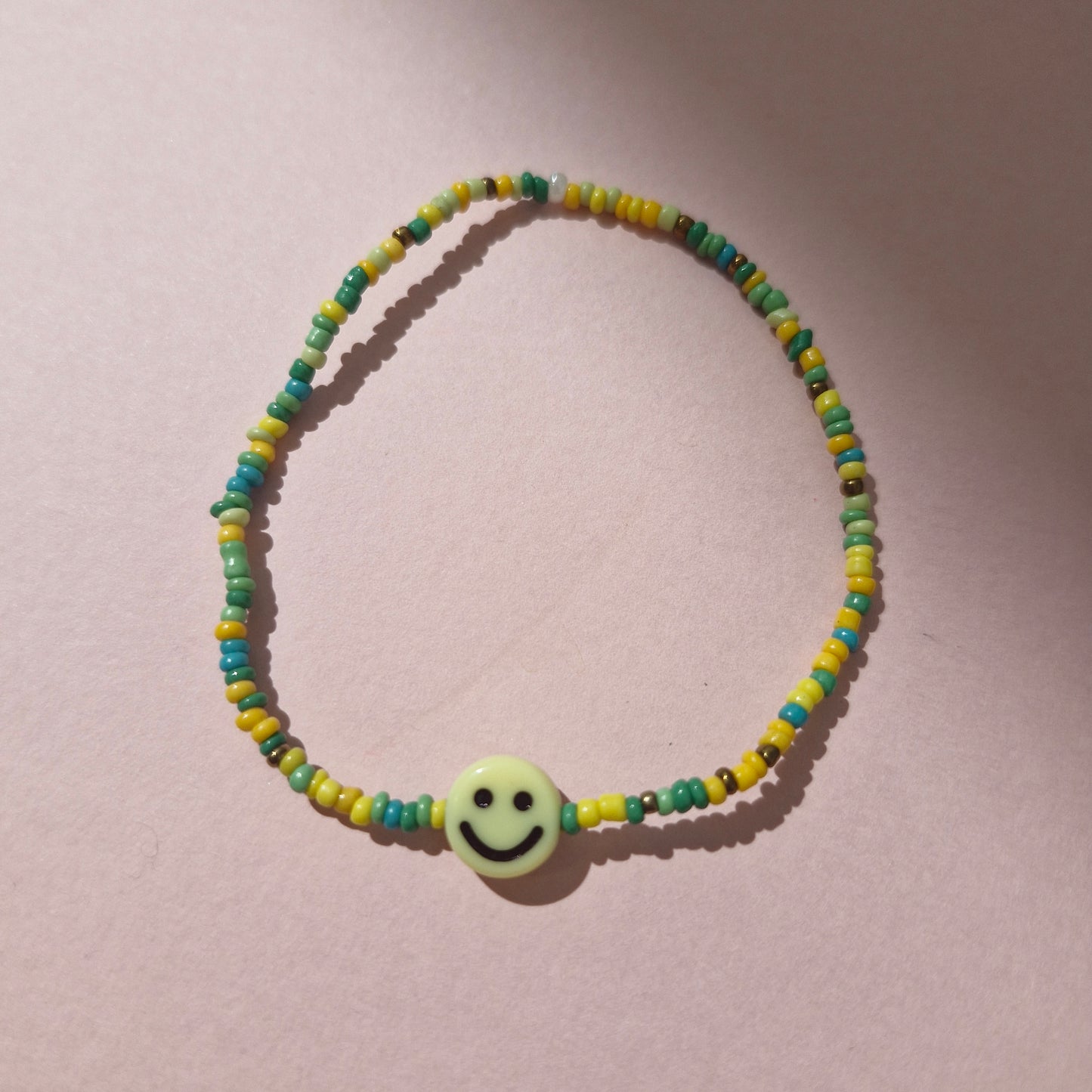 Green/Yellow Friendship Bracelet With A Large Yellow Smiley Face