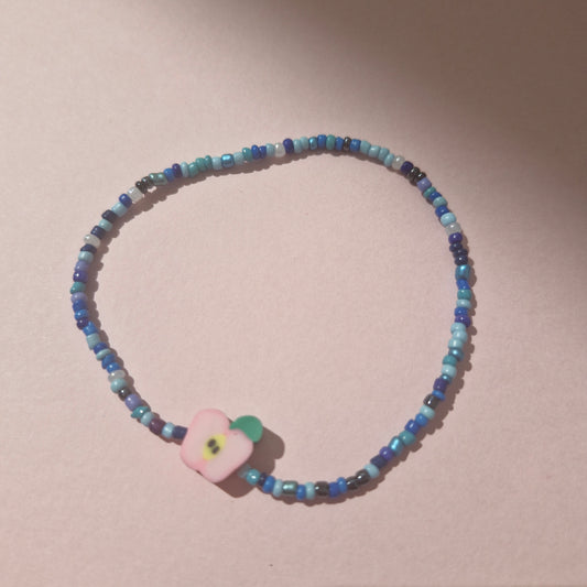 Blue Friendship Bracelet With A Apple Fruit