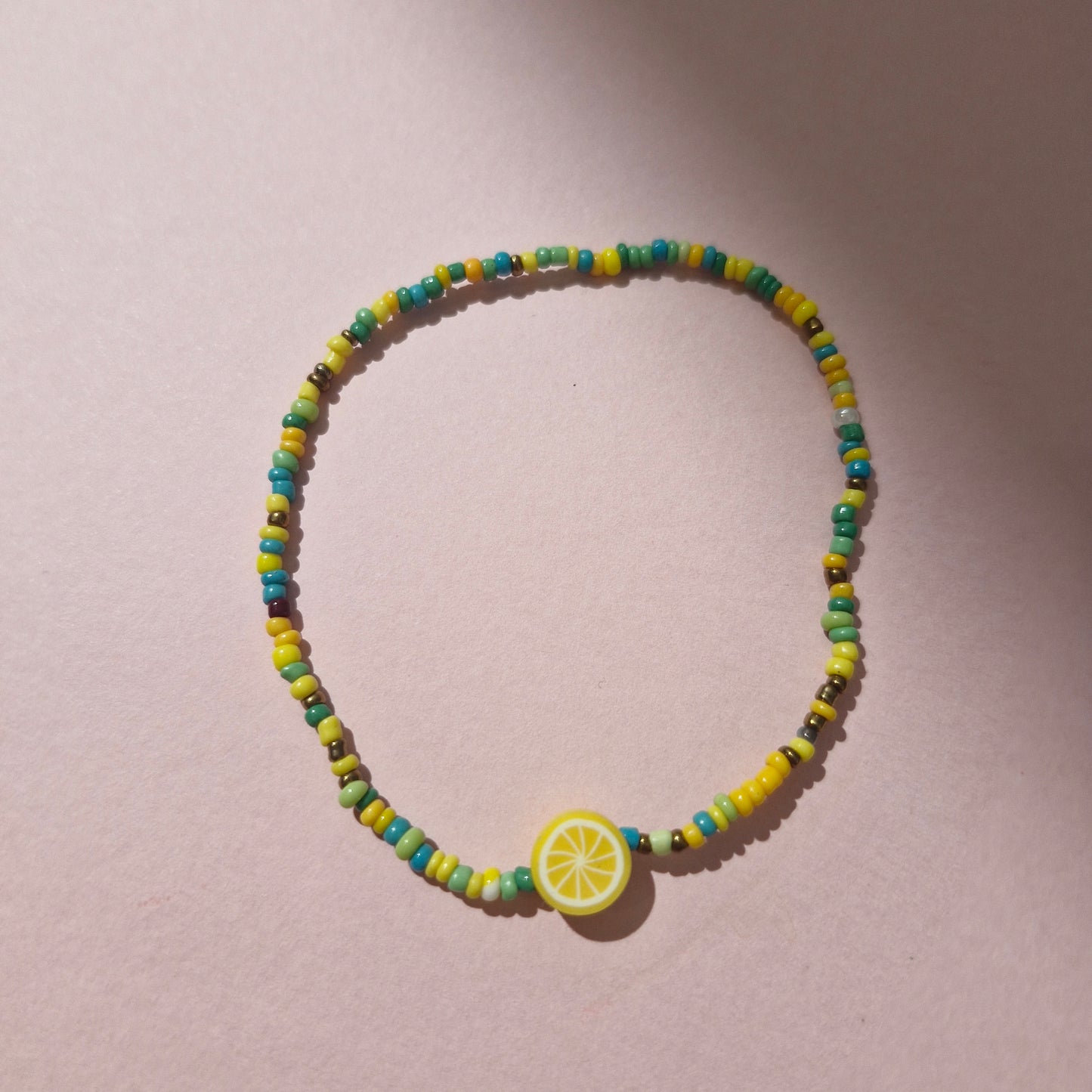 Green/Yellow Friendship Bracelet With A Yellow Lemon Fruit