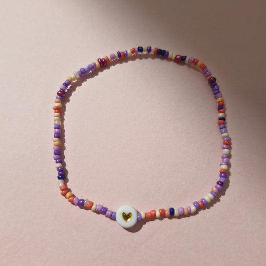 Multicoloured Friendship Bracelet With A Gold Heart