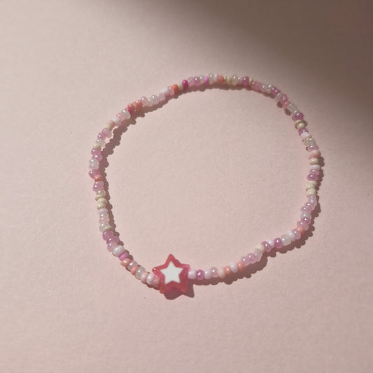 Light Pink Friendship Bracelet With A Bright Pink Star