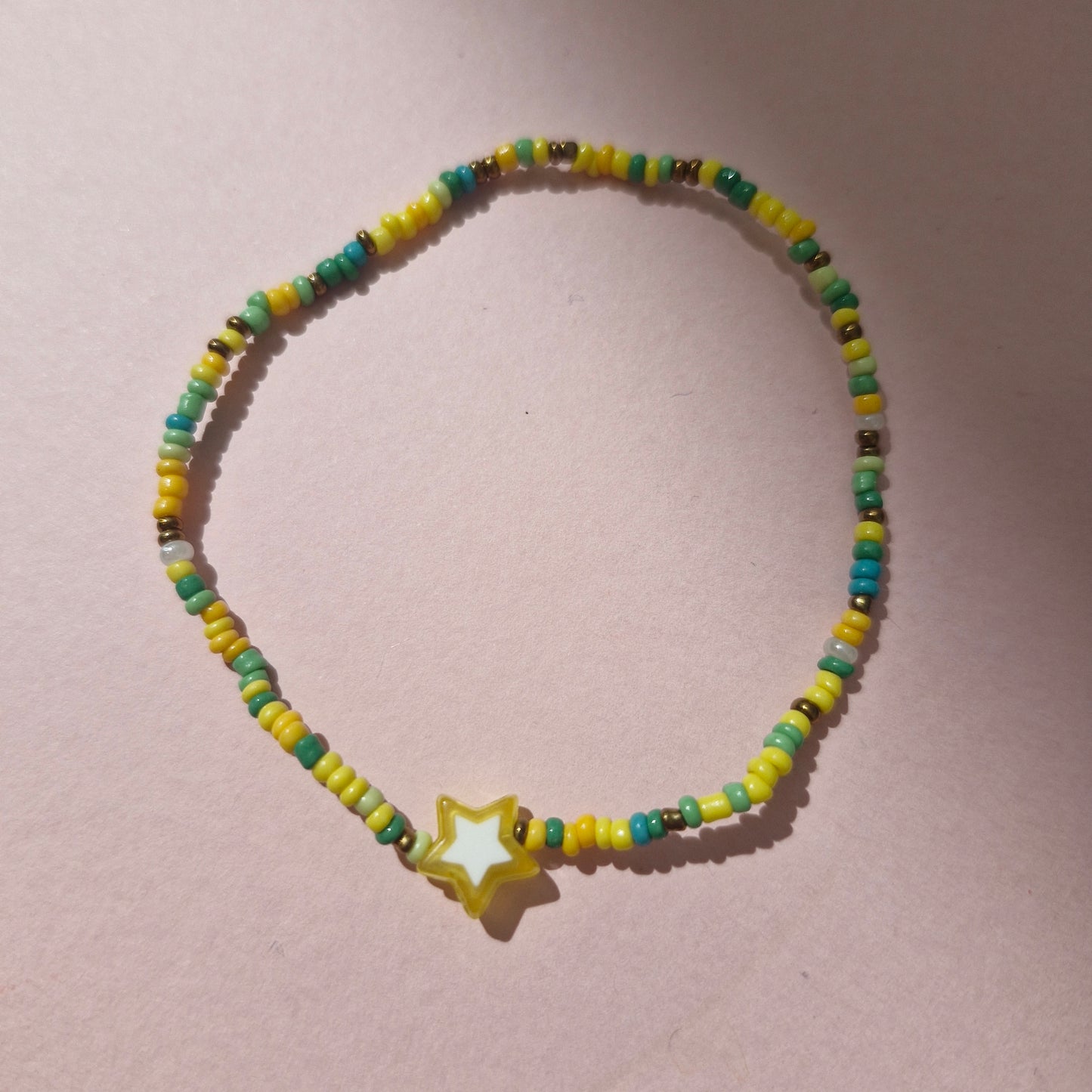 Green/Yellow Friendship Bracelet With A Yellow Star