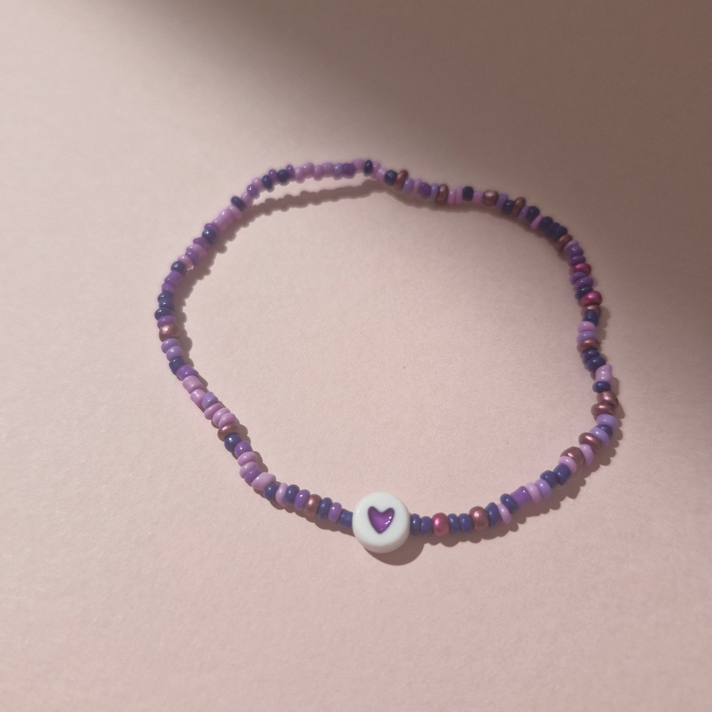 Purple Friendship Bracelet With A Purple Heart