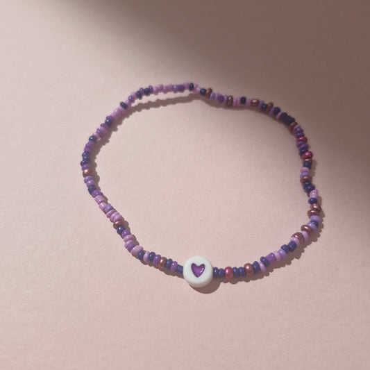 Purple Friendship Bracelet With A Purple Heart